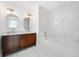 Modern bathroom with marble tile and double vanity at 150 E Robinson St # 2908, Orlando, FL 32801