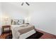 Cozy bedroom with hardwood floors and neutral decor at 150 E Robinson St # 2908, Orlando, FL 32801