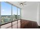 Spacious bedroom with hardwood floors and city views at 150 E Robinson St # 2908, Orlando, FL 32801