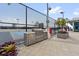 Outdoor grilling area with a basketball court nearby at 150 E Robinson St # 2908, Orlando, FL 32801