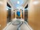 Hallway with elevators and modern design at 150 E Robinson St # 29B, Orlando, FL 32801