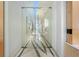 Glass-door entrance to the building at 150 E Robinson St # 2908, Orlando, FL 32801