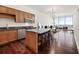 Modern kitchen with island and hardwood floors at 150 E Robinson St # 2908, Orlando, FL 32801
