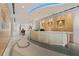 Modern lobby with a curved reception desk at 150 E Robinson St # 2908, Orlando, FL 32801
