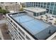 Modern rooftop recreation area with basketball and tennis courts at 150 E Robinson St # 29B, Orlando, FL 32801