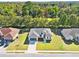 New construction home with a large yard and driveway at 162 Nw 42Nd Pl, Ocala, FL 34475