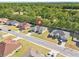 Aerial view of a house on a tree-lined street at 162 Nw 42Nd Pl, Ocala, FL 34475