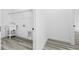 Laundry room with utility sink, shelving and vinyl flooring at 162 Nw 42Nd Pl, Ocala, FL 34475