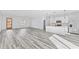Bright and spacious living area with wood-look floors at 162 Nw 42Nd Pl, Ocala, FL 34475