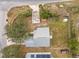 House with a large backyard, patio, and detached shed at 164 Brad Cir, Winter Haven, FL 33880