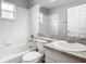 Clean bathroom with a bathtub, toilet, and vanity at 164 Brad Cir, Winter Haven, FL 33880