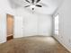 Bright bedroom with ceiling fan and neutral wall colors at 164 Brad Cir, Winter Haven, FL 33880