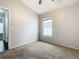 Spacious bedroom with ceiling fan and neutral wall colors at 164 Brad Cir, Winter Haven, FL 33880