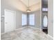 Bright dining area with tile floors and neutral wall colors at 164 Brad Cir, Winter Haven, FL 33880