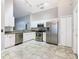 Kitchen with stainless steel appliances and white cabinets at 164 Brad Cir, Winter Haven, FL 33880
