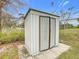 Metal storage shed in backyard at 164 Brad Cir, Winter Haven, FL 33880