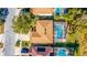 Top-down view of home with pool and surrounding landscape at 1647 Bridgeview Cir, Orlando, FL 32824