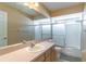 Bathroom with shower/tub combo and updated vanity at 1647 Bridgeview Cir, Orlando, FL 32824