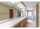 Primary bathroom with double vanity and separate tub at 1647 Bridgeview Cir, Orlando, FL 32824