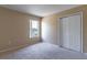 Bedroom with water view and double door closet at 1647 Bridgeview Cir, Orlando, FL 32824