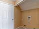 Laundry closet with shelving at 1647 Bridgeview Cir, Orlando, FL 32824
