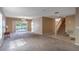 Living room with pool view, chandelier, and sliding glass doors at 1647 Bridgeview Cir, Orlando, FL 32824