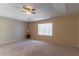 Main bedroom with ceiling fan and window coverings at 1647 Bridgeview Cir, Orlando, FL 32824