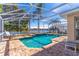 Screened pool with lake view at 1647 Bridgeview Cir, Orlando, FL 32824