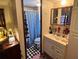 Bathroom with shower/tub combo and vanity at 1960 Pinewood Ln, Mount Dora, FL 32757