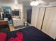 A bright bedroom featuring a bed, closet and ensuite bath at 1960 Pinewood Ln, Mount Dora, FL 32757