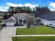 Single-Gathering home with a large backyard and spacious driveway at 2077 Wembley Pl, Oviedo, FL 32765