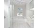 Bathroom boasts a large soaking tub, walk-in shower, and window at 2077 Wembley Pl, Oviedo, FL 32765