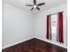 Light and airy bedroom with dark hardwood floors at 2077 Wembley Pl, Oviedo, FL 32765