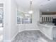 Spacious dining area with large window and view of the pool at 2077 Wembley Pl, Oviedo, FL 32765
