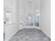 Bright dining room features a chandelier and bay window with white shutters at 2077 Wembley Pl, Oviedo, FL 32765