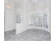 Elegant dining room with bay window, chandelier, and white shutters at 2077 Wembley Pl, Oviedo, FL 32765