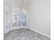 Bright dining room with bay window and elegant chandelier at 2077 Wembley Pl, Oviedo, FL 32765