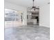 Gathering room with sliding doors leading to the pool area at 2077 Wembley Pl, Oviedo, FL 32765