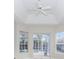Main bedroom with vaulted ceiling, ceiling fan and sliding doors to the pool at 2077 Wembley Pl, Oviedo, FL 32765