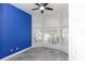 Spacious office with blue accent wall and bay window at 2077 Wembley Pl, Oviedo, FL 32765