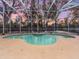 Relaxing screened-in pool area, perfect for outdoor enjoyment at 2077 Wembley Pl, Oviedo, FL 32765
