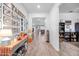 Bright and spacious entryway with decorative console table and view to living area at 2323 Nuthatch St, St Cloud, FL 34771