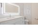 Modern bathroom with white vanity and marble-look walls at 2397 River Tree Cir, Sanford, FL 32771