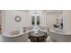 Elegant living room featuring four armchairs around a coffee table, and marble flooring at 2397 River Tree Cir, Sanford, FL 32771