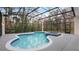 Enjoy this refreshing pool and spa, perfect for relaxation at 2397 River Tree Cir, Sanford, FL 32771