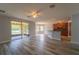 Open kitchen with island and dark wood cabinets at 2625 Brompton Ct, Orlando, FL 32833