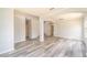 Spacious living room with gray walls and wood-look flooring at 2625 Brompton Ct, Orlando, FL 32833