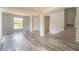 Bright and airy living area with hardwood floors and large window at 2625 Brompton Ct, Orlando, FL 32833