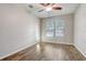 Bright bedroom with wood flooring and a window at 264 Wallrock Ct, Ocoee, FL 34761