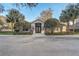 Community clubhouse with landscaping and parking at 264 Wallrock Ct, Ocoee, FL 34761